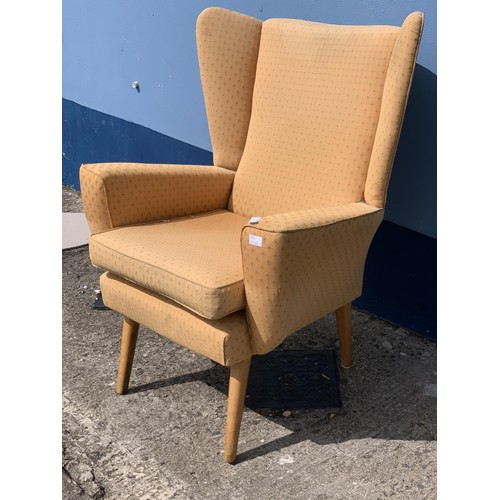 711 - A VINTAGE STYLE WINGBACK CHAIR