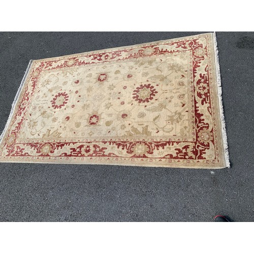 54 - A HAND MADE ORIENTAL RUG APPROX 97X60