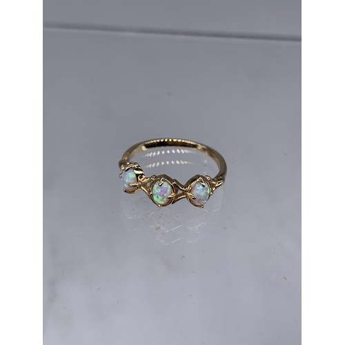 225a - A 3 STONE OPAL TYPE RING in silver