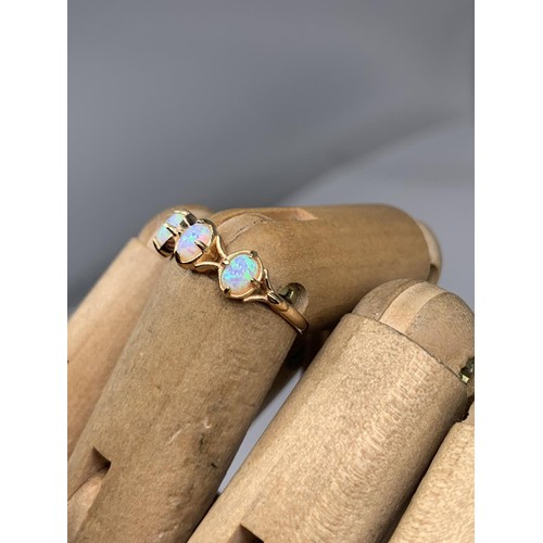 225a - A 3 STONE OPAL TYPE RING in silver