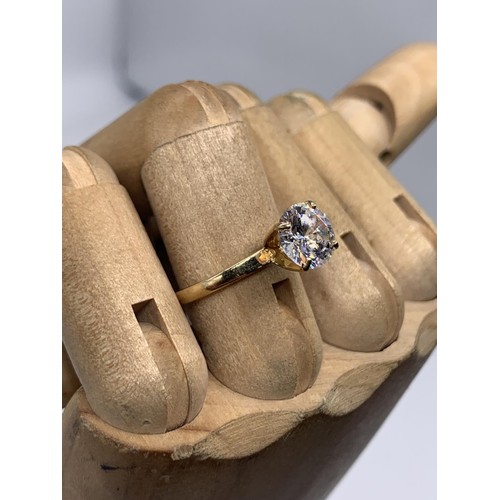 618A - 14K GOLD CZ SOLITAIRE RING 2.6gms SIZE N