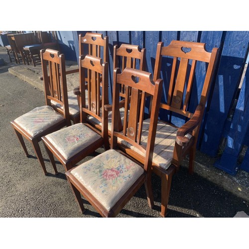 7 - A SET OF 6 MAHOGANY IN ARTS AND CRAFTS STYLE ON TAPERING LEG