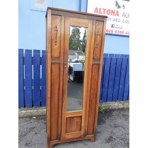 20 - AN OAK MIRROR DOOR SINGLE ROBE