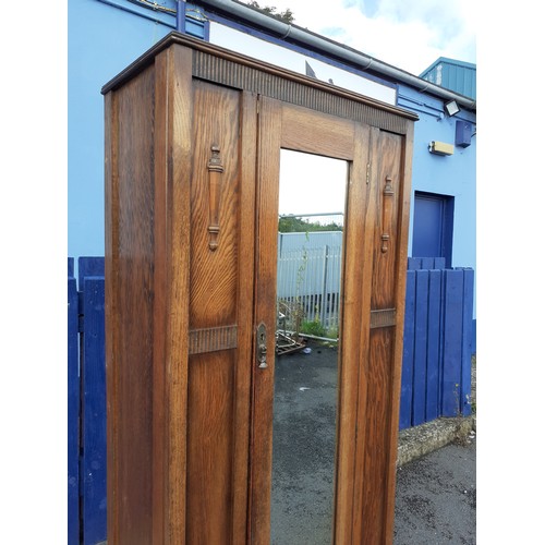 20 - AN OAK MIRROR DOOR SINGLE ROBE