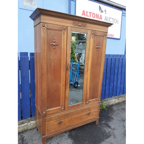 50 - AN OAK MIRROR DOOR ROBE  OVER DRAWER