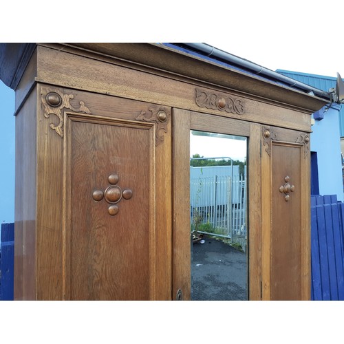 50 - AN OAK MIRROR DOOR ROBE  OVER DRAWER