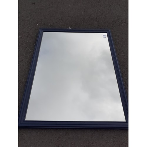 54 - PAINTED BLUE FRAMED MIRROR MEASURES 52 1/2 x 40