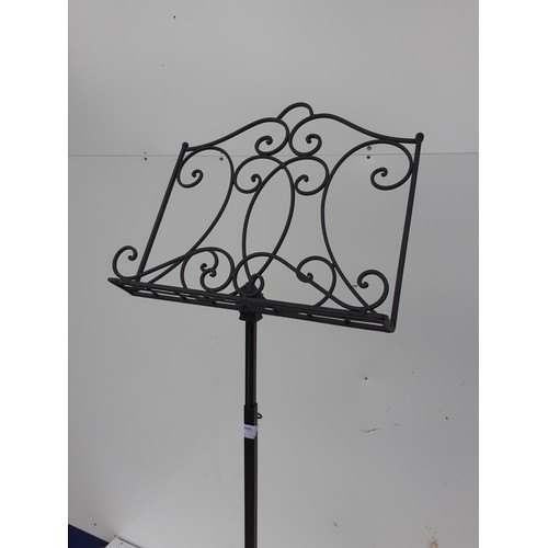 83 - AN EXTENDABLE CAST IRON MUSIC STAND