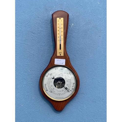 84 - AN OAK CASED BAROMETER