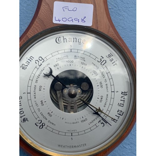 84 - AN OAK CASED BAROMETER