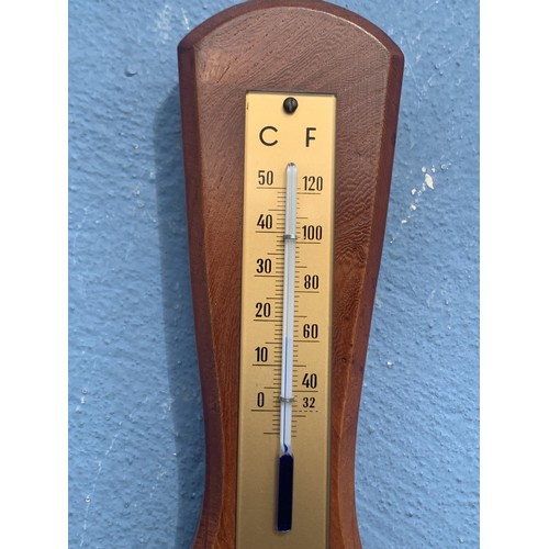 84 - AN OAK CASED BAROMETER