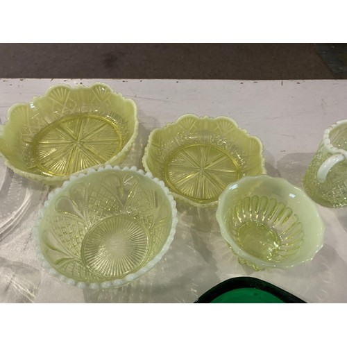 14 - A CUT GLASS BOWL AND A SELECTION OF VASELINE GLASS