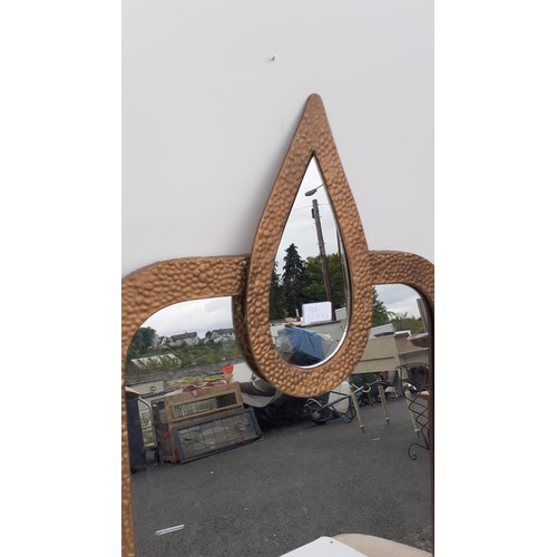 69 - SHAPED DIMPLED MIRROR 36X20