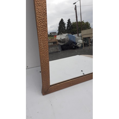 69 - SHAPED DIMPLED MIRROR 36X20