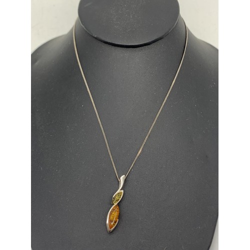 238 - SILVER 2 TONE AMBER PENDANT ON SILVER CHAIN