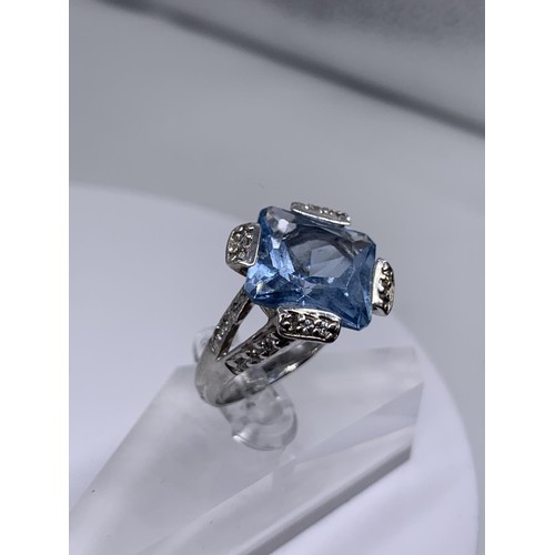 239 - SILVER LARGE SQUARE TOPAZ AND GEM SET RING