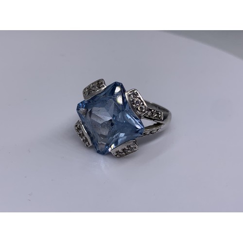 239 - SILVER LARGE SQUARE TOPAZ AND GEM SET RING