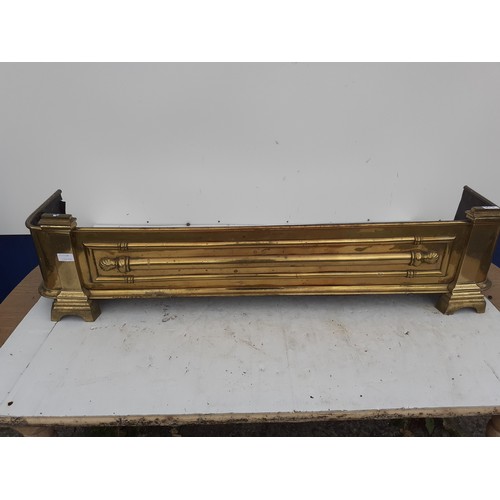 80 - A VICTORIAN BRASS FENDER