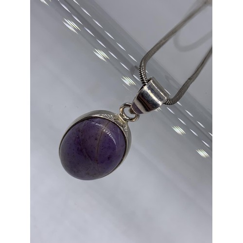 269 - SILVER & PURPLE STONE PENDANT ON A SILVER CHAIN