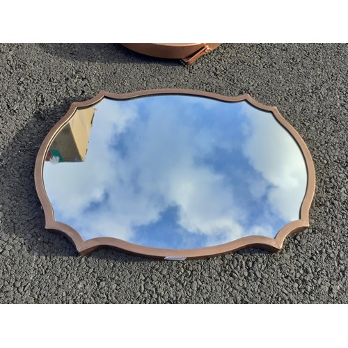 175 - A SHAPED COPPER FINISH FRAMED MIRROR 24X17