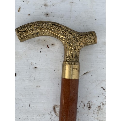 443 - BRASS HANDLED WALKING STICK WITH BRANDY TUBE