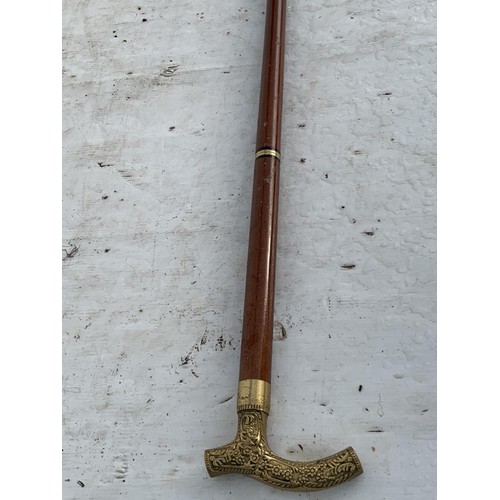 443 - BRASS HANDLED WALKING STICK WITH BRANDY TUBE