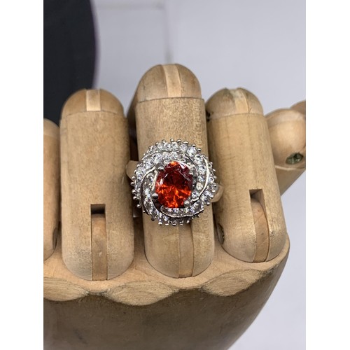 224 - DESIGNER SILVER GEM SET RING WITH LARGE RED STONE