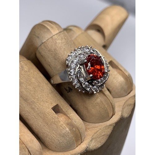 224 - DESIGNER SILVER GEM SET RING WITH LARGE RED STONE