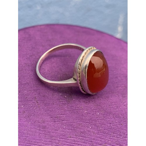 246 - HEAVY SILVER & CARNELIAN STONE RING