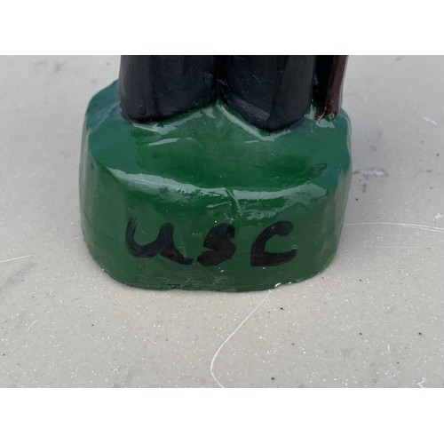 407 - A HAND PAINTED POLICE FIGURE WITH U S C ON BASE 10