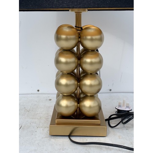 413 - A NEW GILT STACKING BALL TABLE LAMP