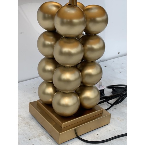 413 - A NEW GILT STACKING BALL TABLE LAMP