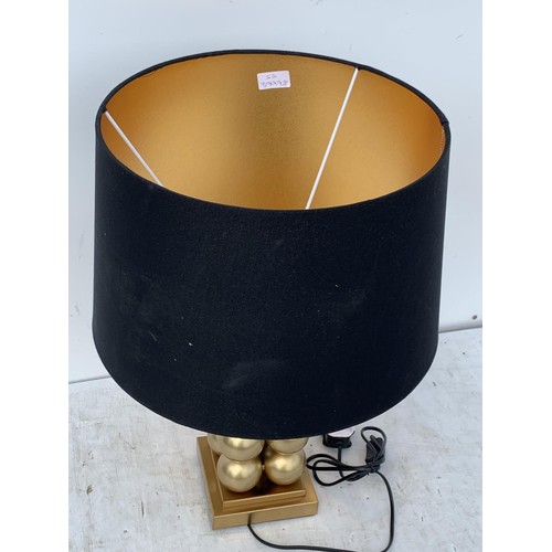 413 - A NEW GILT STACKING BALL TABLE LAMP