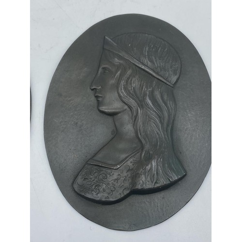 497 - A PAIR OF SPELTER PLAQUES 5X4