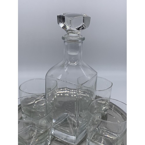 518 - A BOXED DECANTER AND GLASS SET WITH TRAY