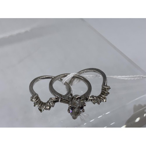 242 - A 3 PIECE SILVER RING SET