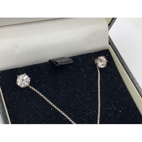 632 - A BOXED NECKLACE AND EARRING SET