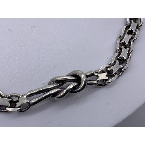 633 - A SILVER LOVE KNOT BRACELET