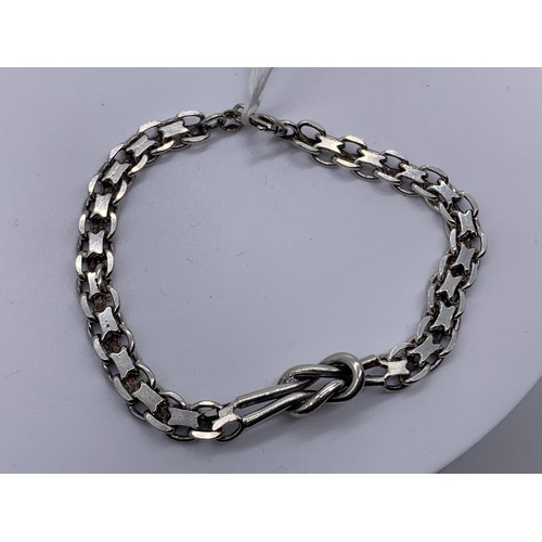 633 - A SILVER LOVE KNOT BRACELET