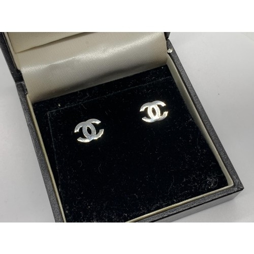 645 - A PAIR OF CHANEL EARRINGS IN BOX