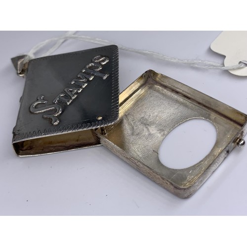 647 - A SILVER STAMP BOOK PENDANT 15.9grms 2.5X3 CMS