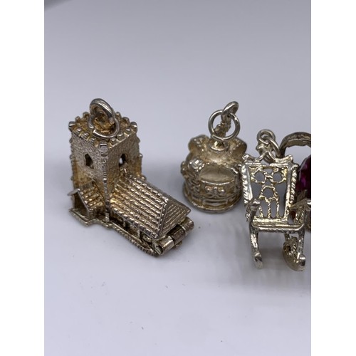 657 - 5 ASSORTED COLLECTABLE SILVER CHARMS 25grms