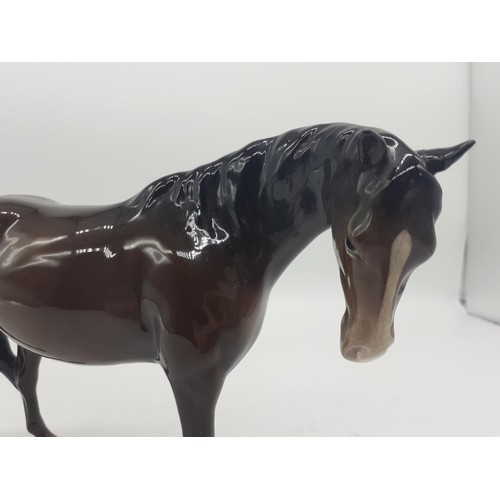 667 - BESWICK MODEL OF A BROWN GLOSS HORSE