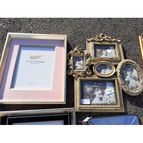 165 - A QUANTITY OF NEW PHOTO FRAMES