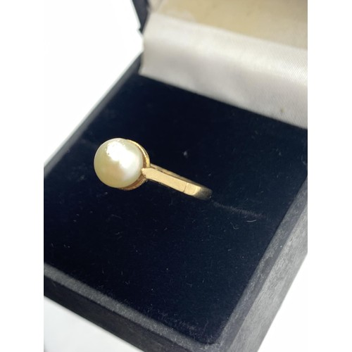 702 - 9CT GOLD PEARL RING