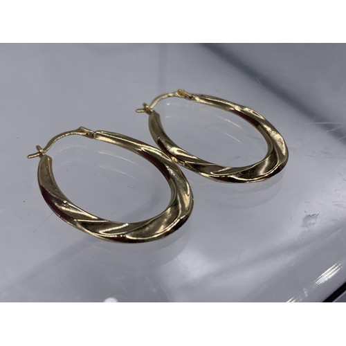 704 - A PAIR OF 9CT GOLD HOOP EARRINGS