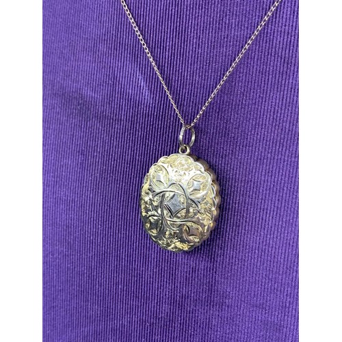 707 - BEAUTIFULLY ORNATE LOCKET ON 9CT CHAIN 8 GRAMS