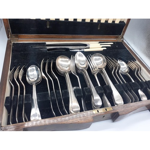 530 - AN OAK CASED CANTEEN OF CUTLERY 47 PIECE (WITH BRASS PLAQUE A PRESENTATION FROM MASONIC LODGE