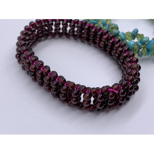 739 - A TURQUOISE BEAD AND AMETHYST BEAD BRACELETS