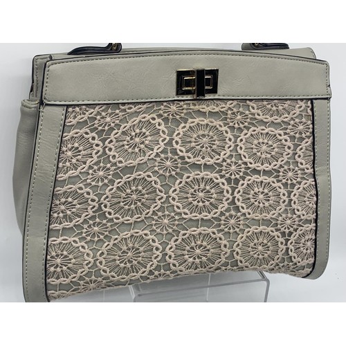 556 - 3 DESIGNER HANDBAGS